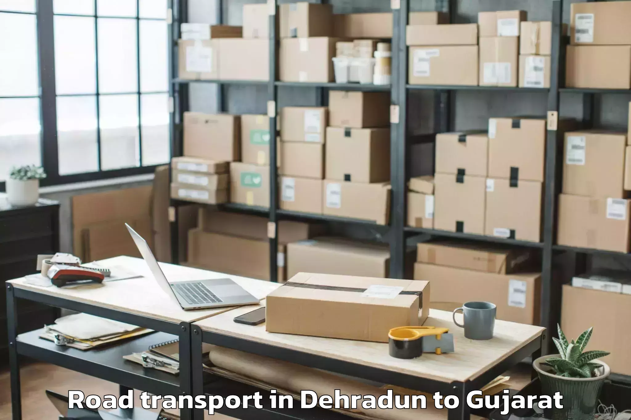 Top Dehradun to Gondal Road Transport Available